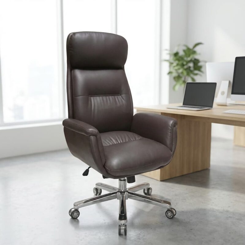 High-back executive leather chair featuring padded seat, cushioned armrests, chrome swivel base, smooth castor wheels, and ergonomic design in a modern office environment