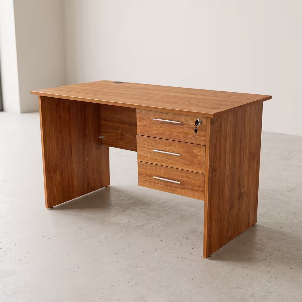 Wooden 3 Drawer Office Desk in a warm walnut finish featuring a spacious desktop with wire grommets and a integrated 3-drawer storage pedestal on the right side.