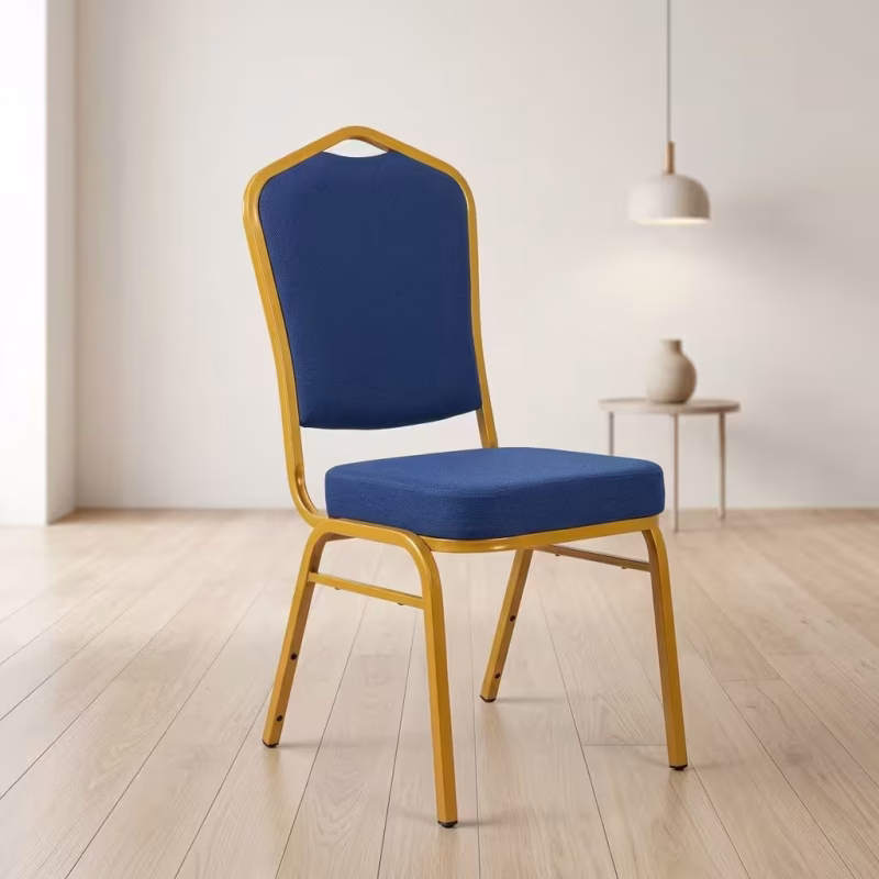 Blue Gold Banquet Chair featuring a vibrant royal blue fabric upholstered seat and crown backrest, supported by a metallic gold powder-coated steel frame with floor glides.