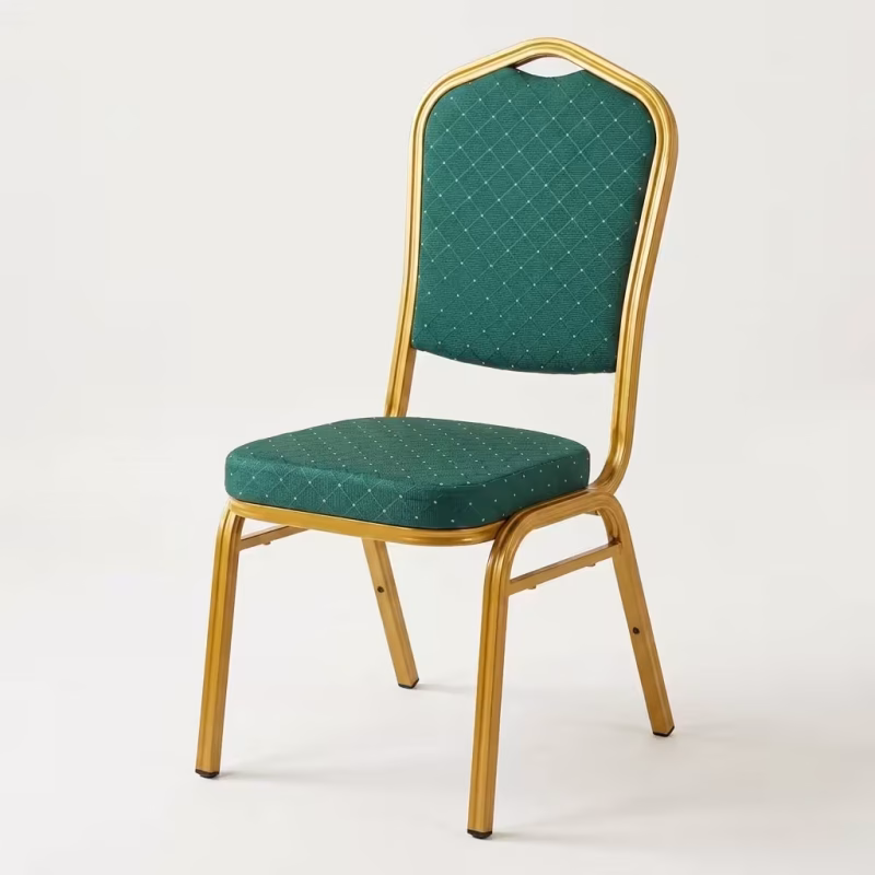 Green Gold Banquet Chair featuring an oval backrest, vibrant green patterned fabric upholstery with gold dot accents, and a metallic gold-finished steel frame.