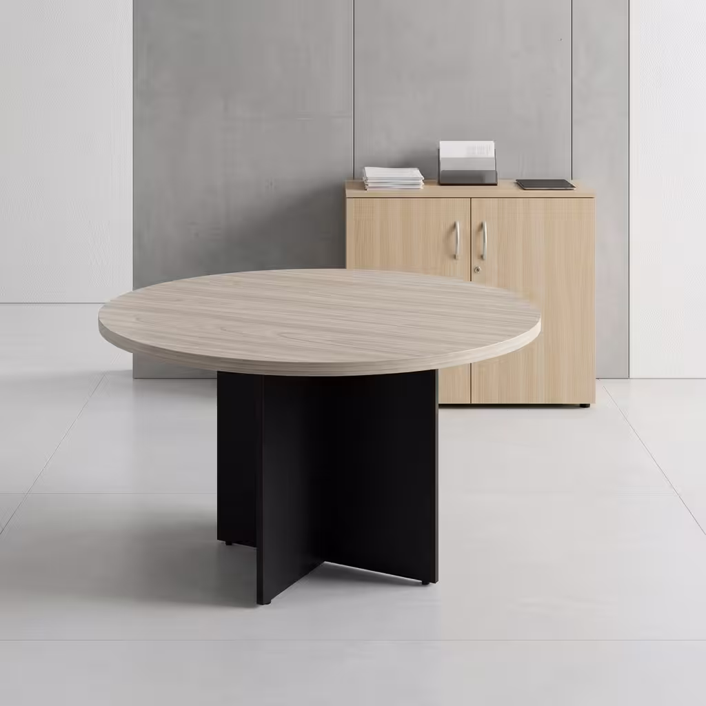 Round Office Meeting Table featuring a natural oak wood-grain circular tabletop with a central silver cable management flip-cover, supported by a matte black steel base.
