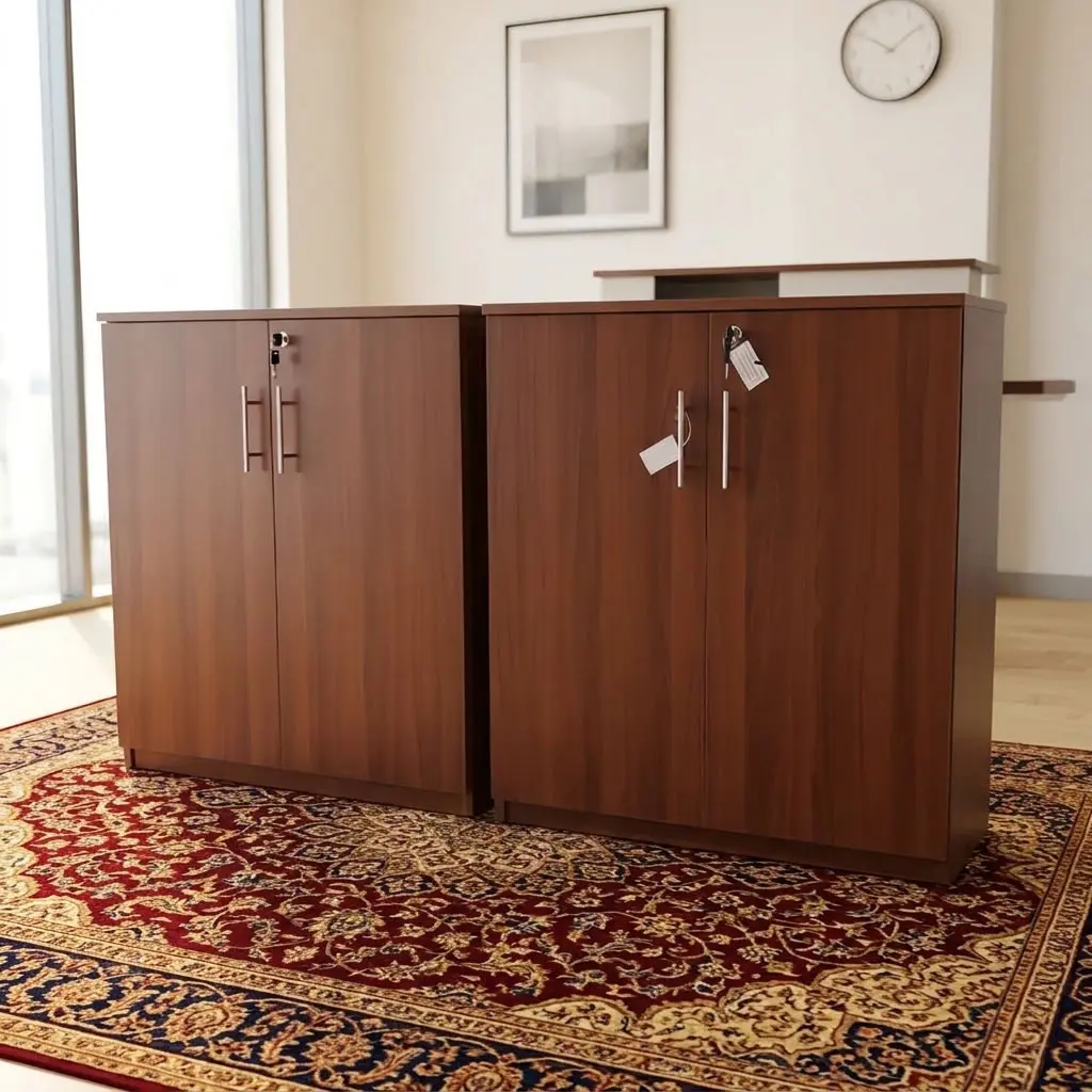 Two Premium Executive Wooden Double-Door Storage Credenza Cabinets side-by-side in a rich mahogany finish with key locks and brushed steel handles on an ornate rug in an executive office